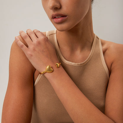 Asymmetric heart bracelet