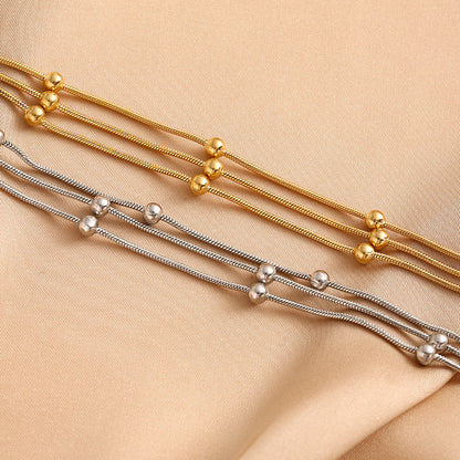 18K gold double-layer small round bead transfer bead bracelet