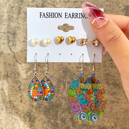 Conjunto de pendientes de cadena con forma de estrella y corazón retro 