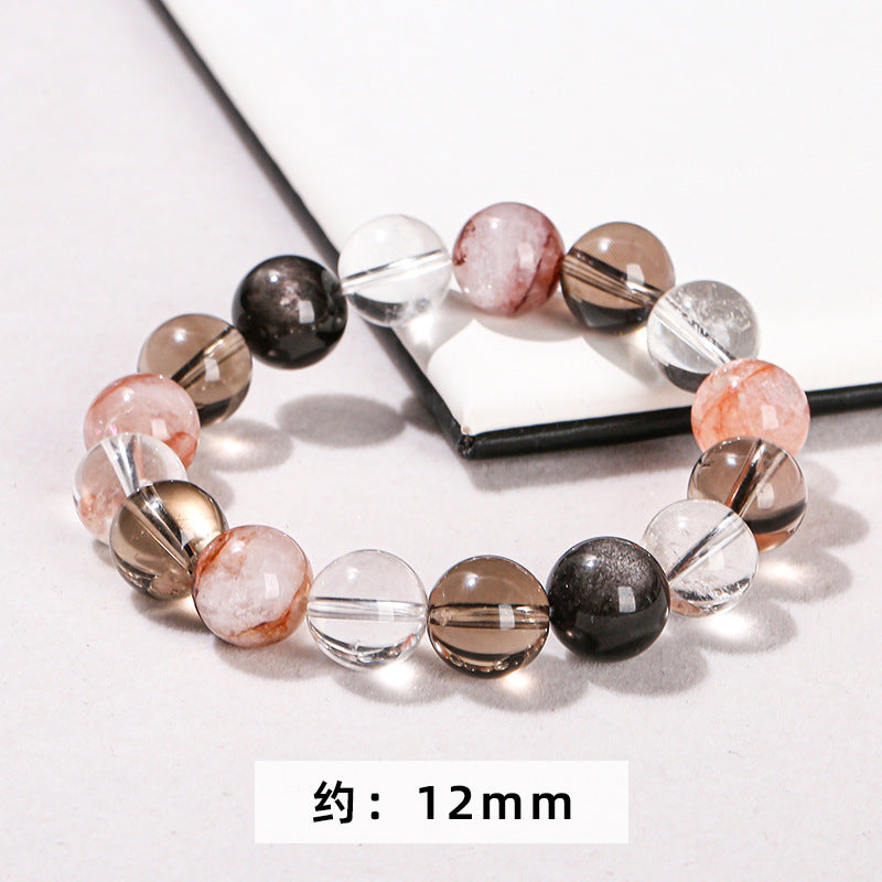 Pulsera de cuentas redondas con hilo mixto de obsidiana plateada y cristal blanco de té 