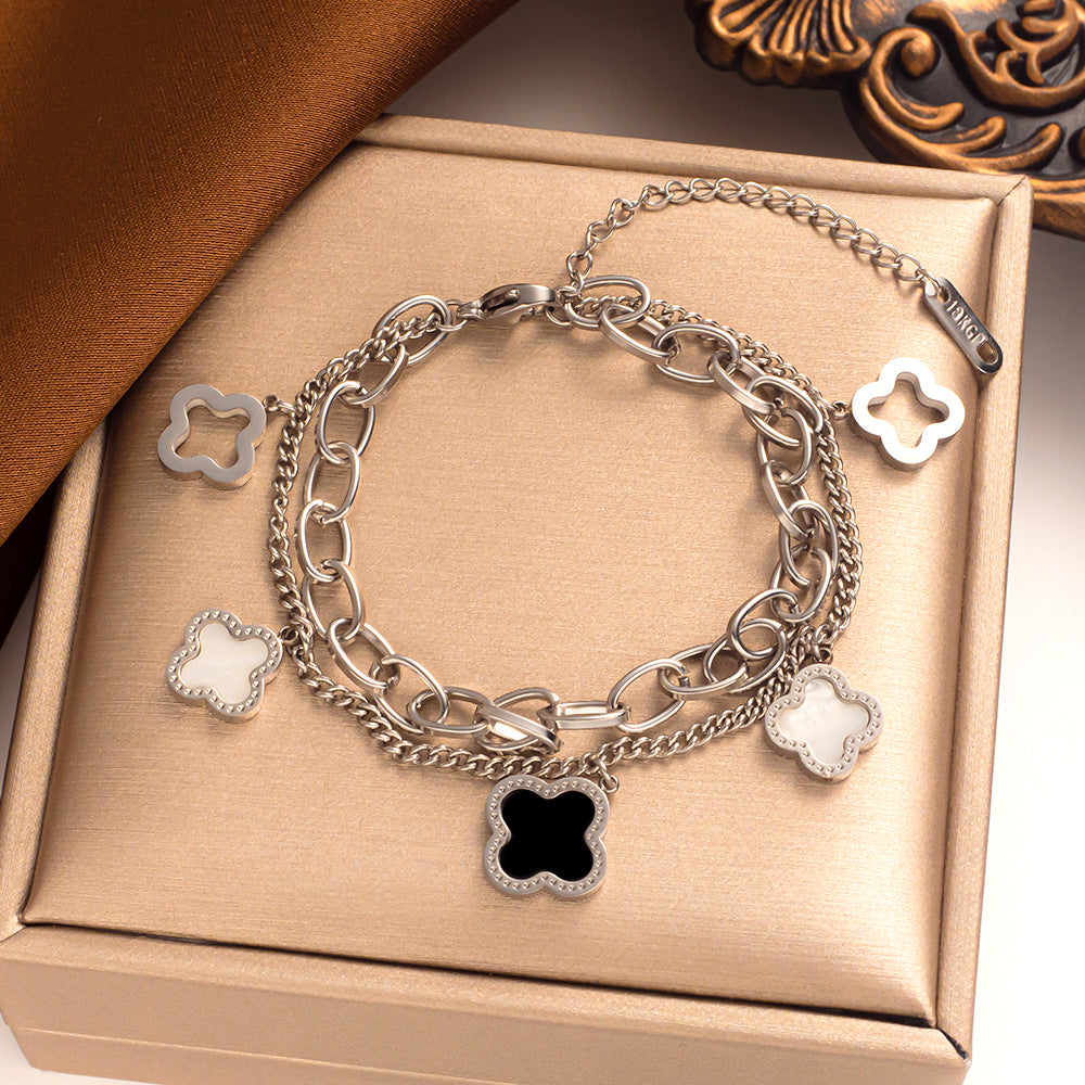Pulsera de trébol de cuatro hojas de doble capa de acero de titanio: moderna y lujosa 