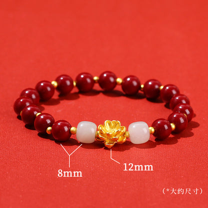 Pulsera de loto de metal arena dorada morada. 