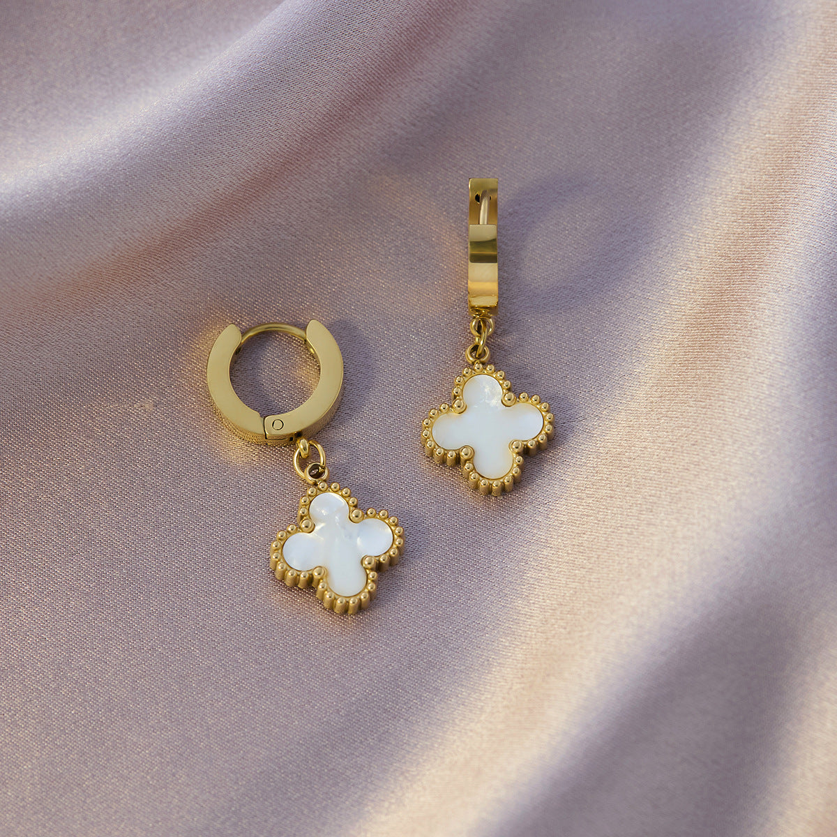 Four-leaf clover titanium steel ear buckle