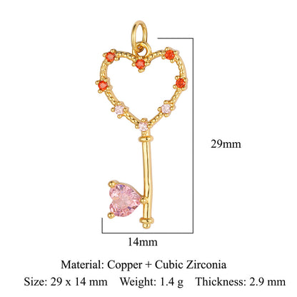 Colgante de cobre y circonita con forma de llave y corazón de melocotón 
