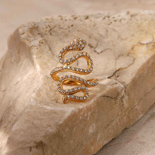 Anillo de serpiente curvado con diamantes 