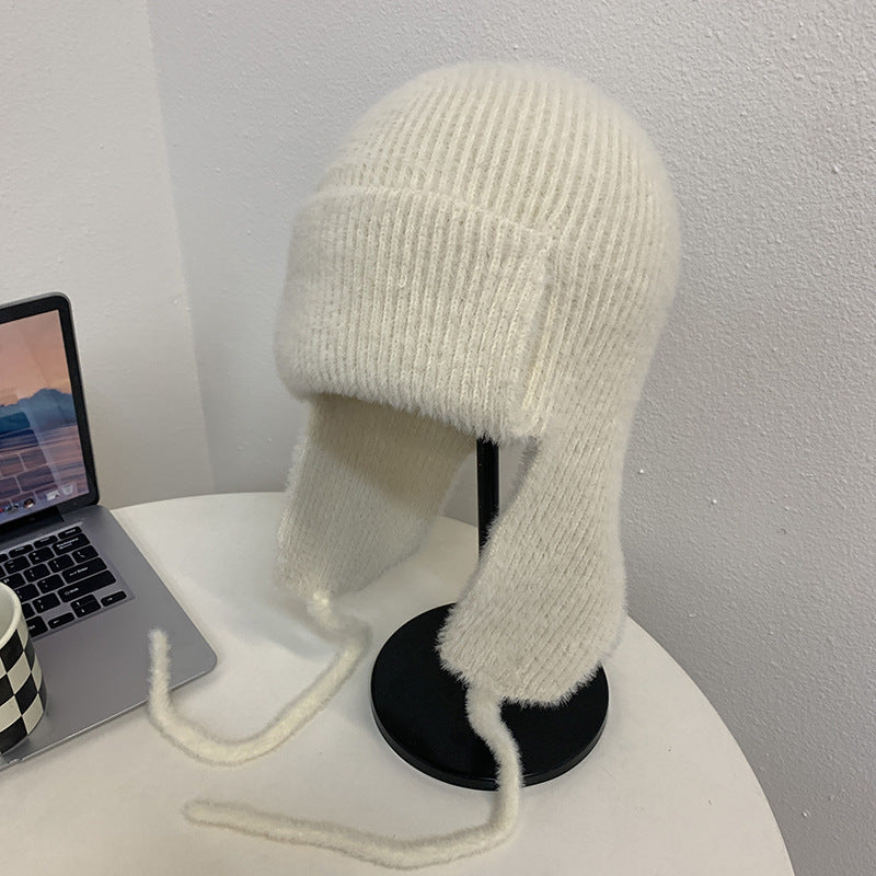 Acogedor gorro con orejeras de mohair para invierno 