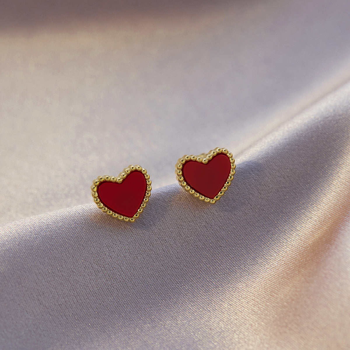 Four-leaf clover titanium steel ear buckle