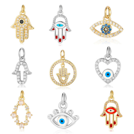 Colgante de cobre y circonita con forma de ojo del diablo y corazón de melocotón y perla 