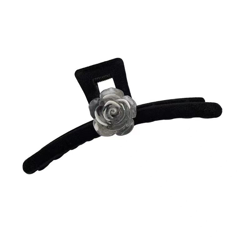 Pinza de camelia negra 
