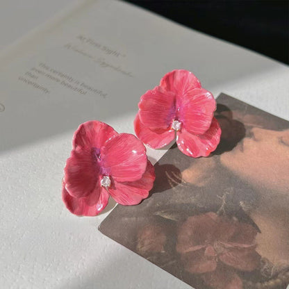 Pendientes tridimensionales de phalaenopsis con pétalos que gotean aceite en primavera y otoño 