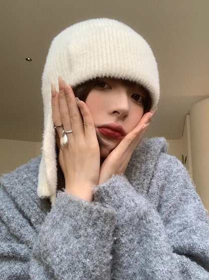 Acogedor gorro con orejeras de mohair para invierno 