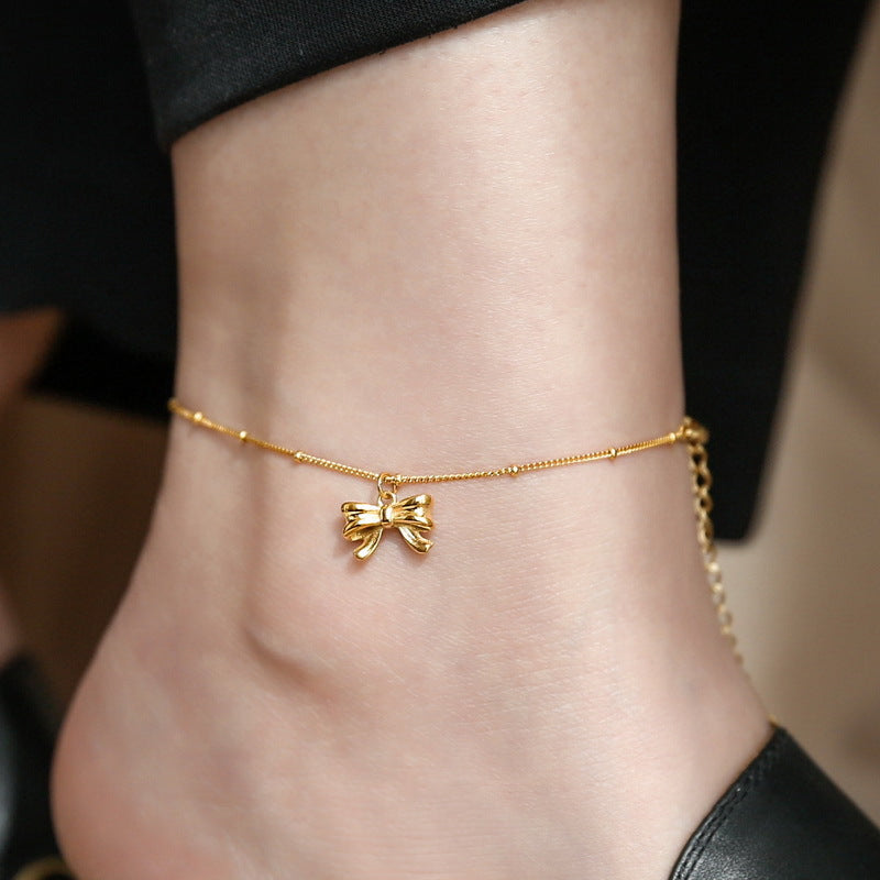 Gold bow anklet