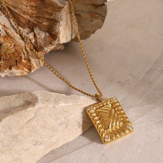 Collar con colgante de strass roscado 