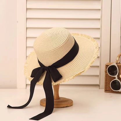 Sombrero de paja con lazo de tendencia para mujer, sombrero de ala plana tejido para vacaciones de verano 