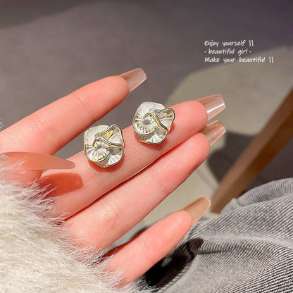 Drip glaze camellia stud earrings are simple