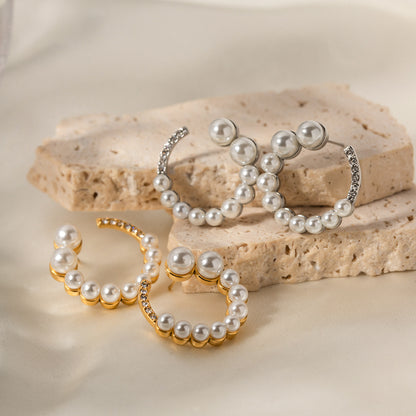 C-shaped earrings with full diamonds and pearls