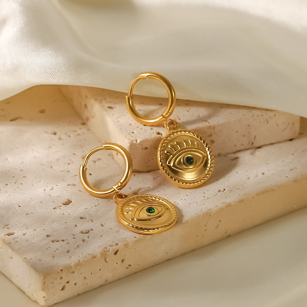 Eye pendant earrings