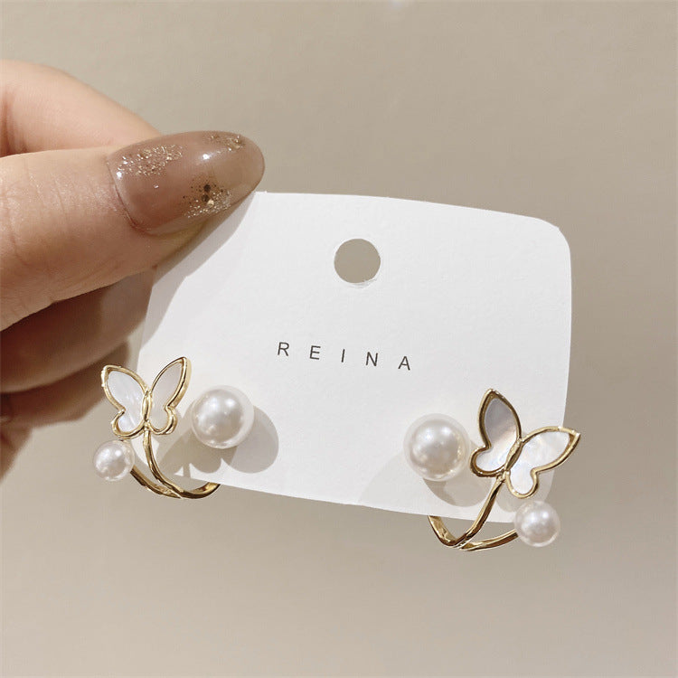 Butterfly pearl earrings are removable and multi-wear.