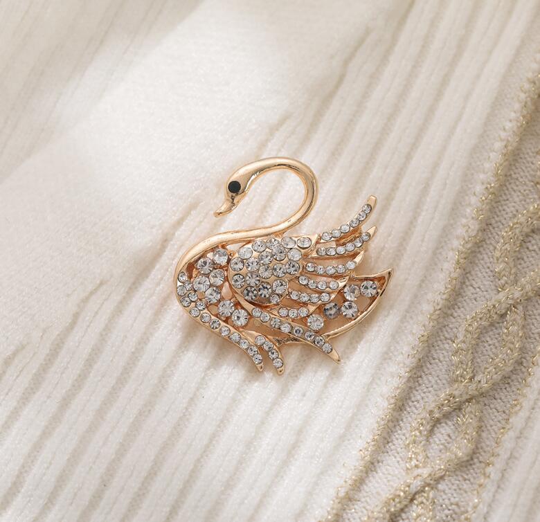 Diamond swan brooch ins