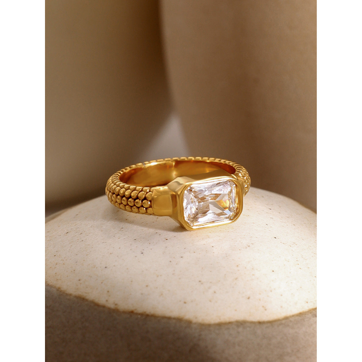 Textured rectangular zirconia ring
