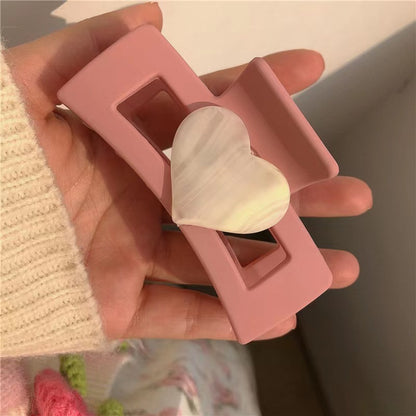 Garra de corazón rosa 