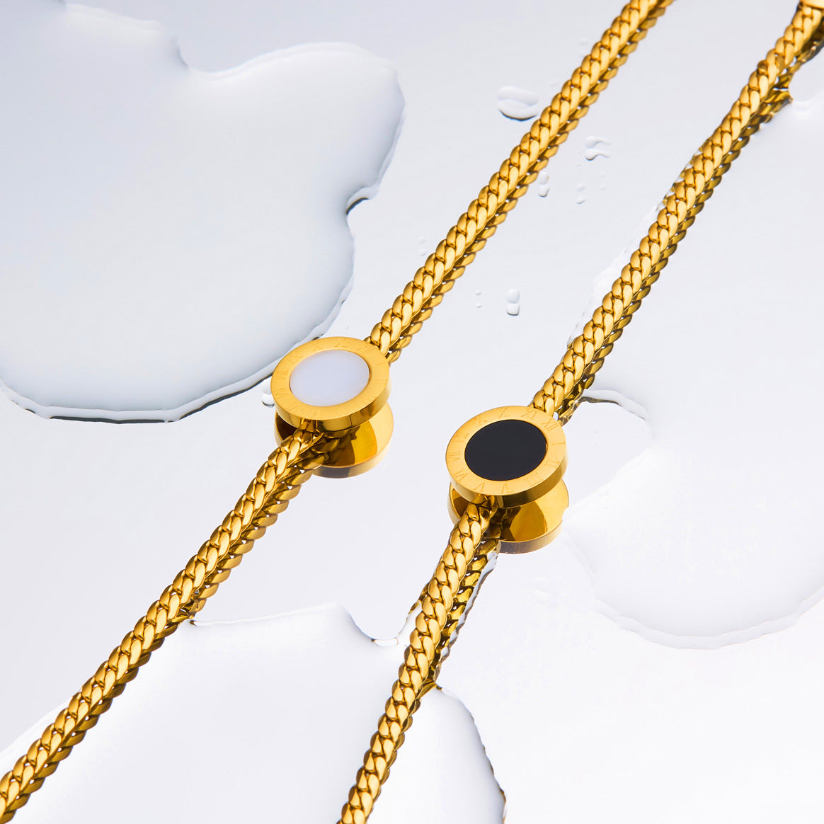 Titanium-Steel Snake Bone Whip Chain Bracelet with Four-Leaf Clover