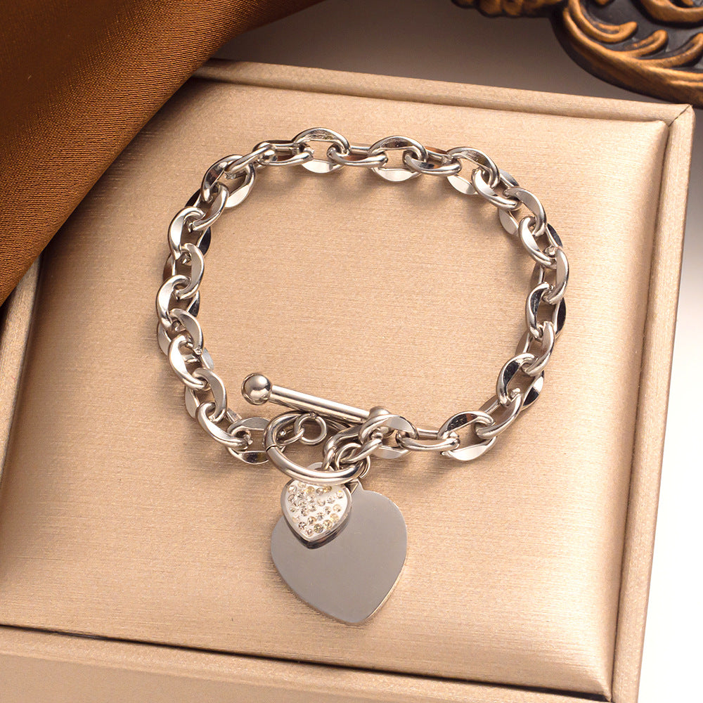 Pulseira Simple Heart Titanium em ouro 18k com fecho em T 