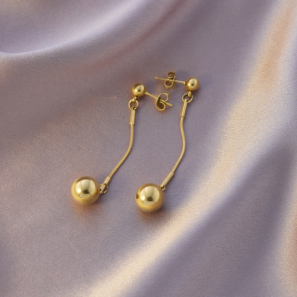 Four-leaf clover titanium steel ear buckle