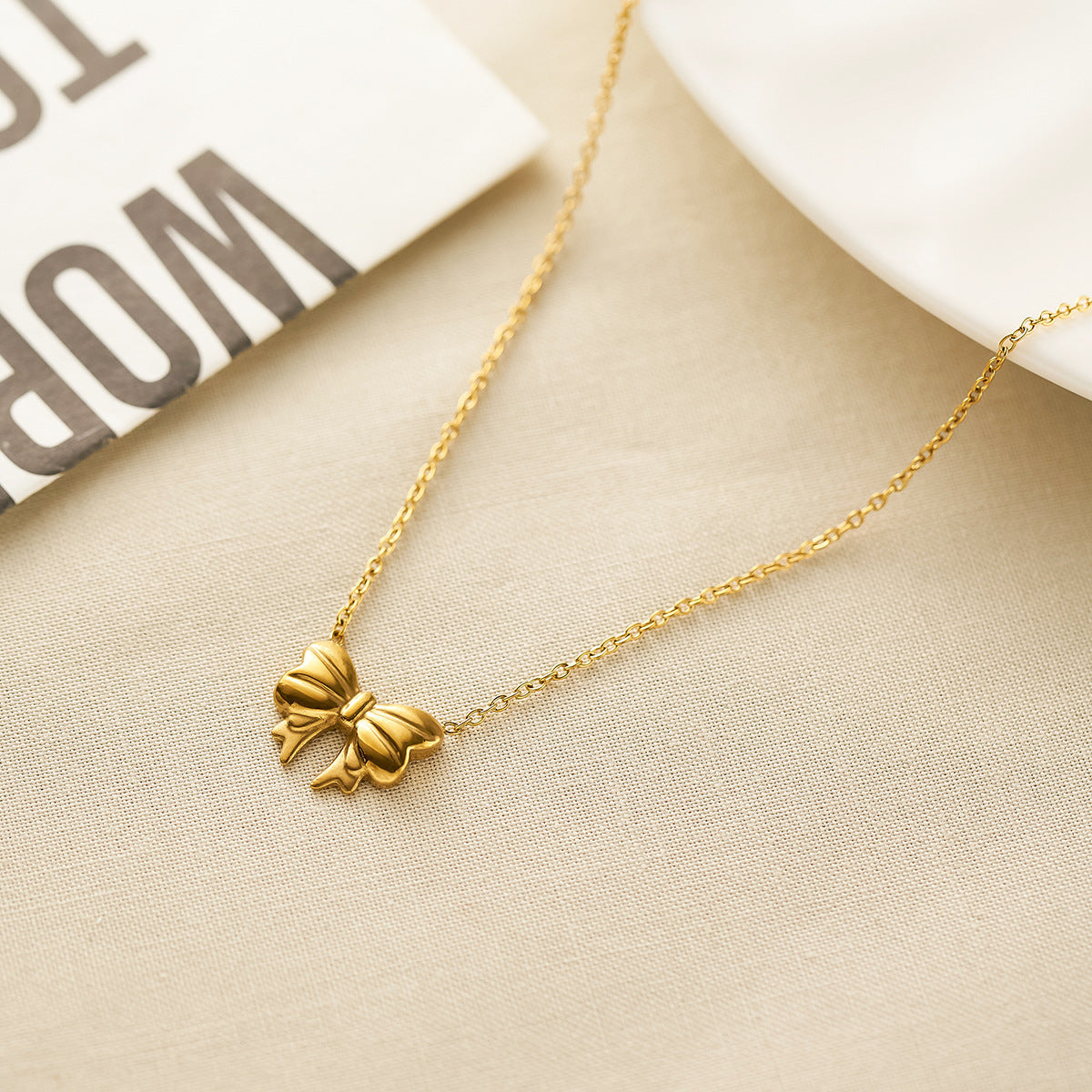 Women's Titanium Steel Bow Necklace & Stud Set — 18K Gold-Plated (Non-Fading)