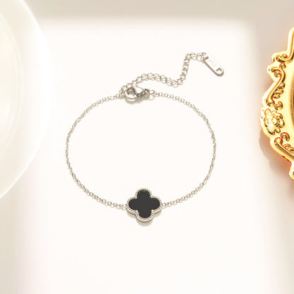 Pulseira feminina em aço titânio - trevo preto e branco, corrente em ouro rosa 