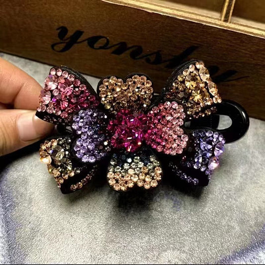 Horquilla con forma de pico de pato y mariposa tridimensional con diamantes de imitación 
