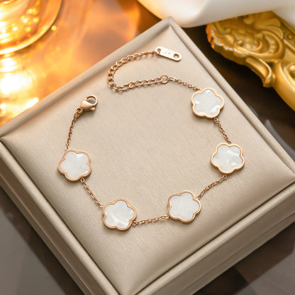 Pulsera de nácar de oro y acero titanio - De moda