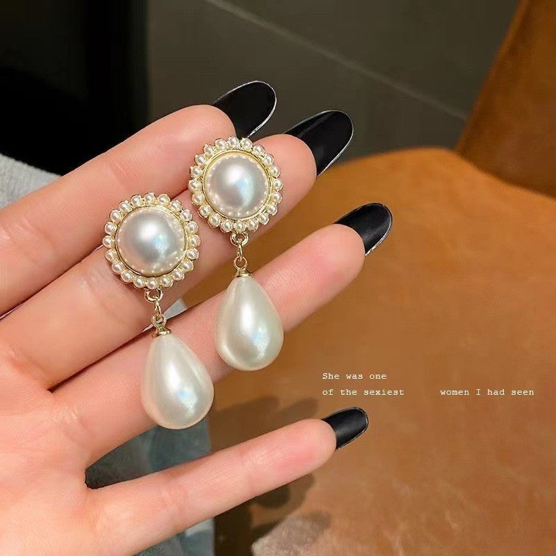 Pendientes de perla ovalada roja 