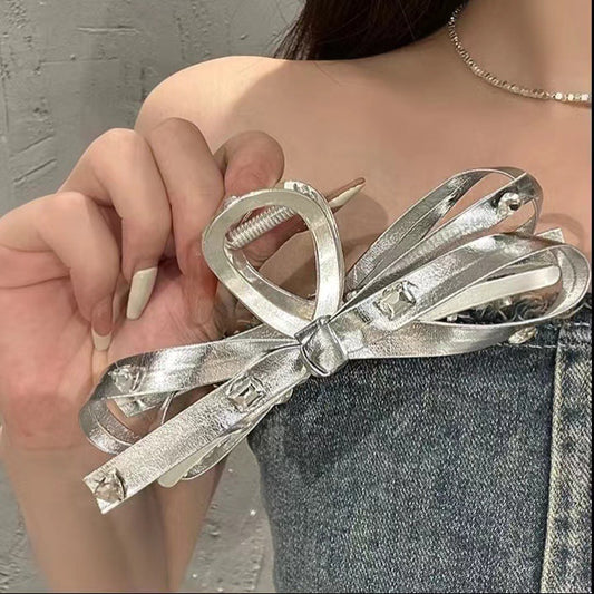 Large silver bow grab clip female