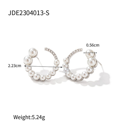 C-shaped earrings with full diamonds and pearls