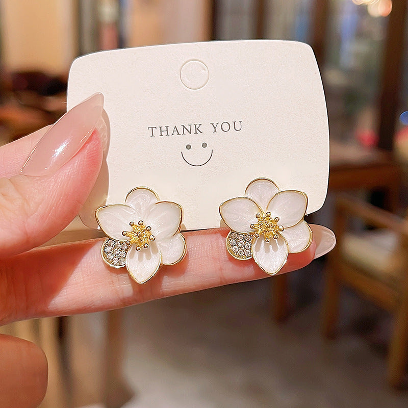 White petal earrings