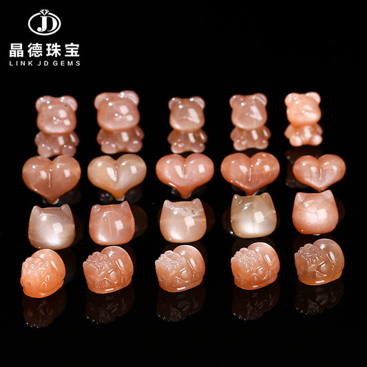 Orange moonstone carving sunstone