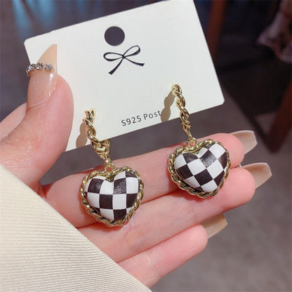 Black leather heart checkerboard stud earrings