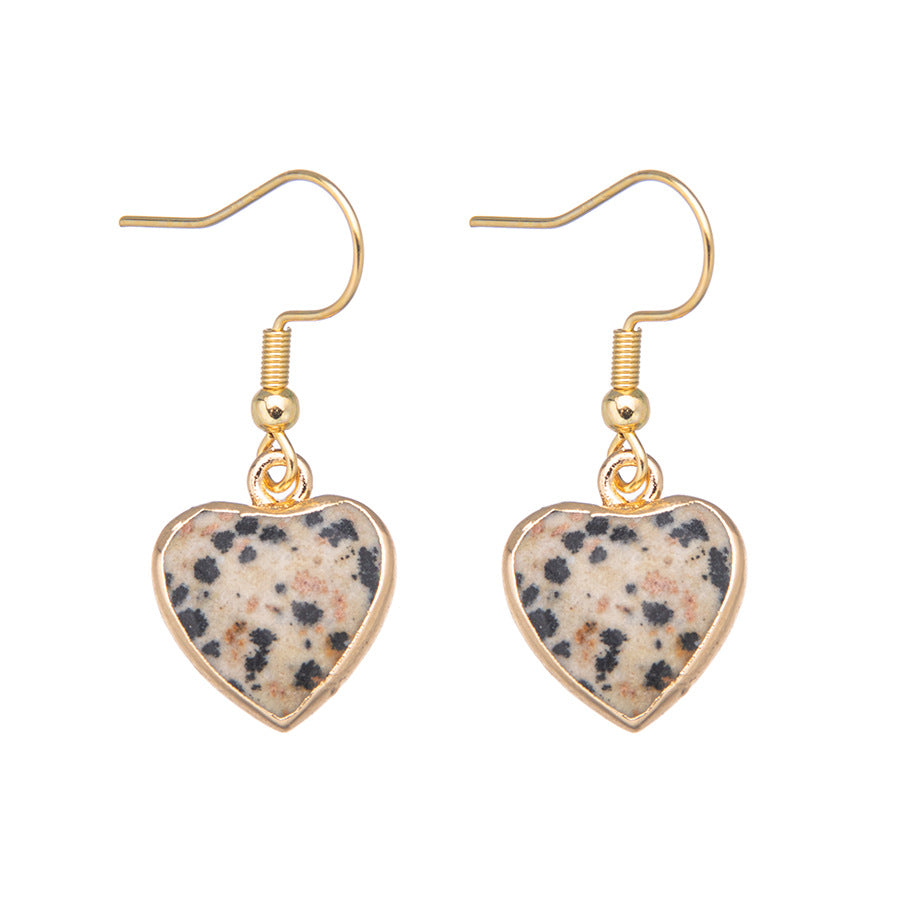 Brincos de aço inoxidável com coração de cristal facetado com borda dourada 