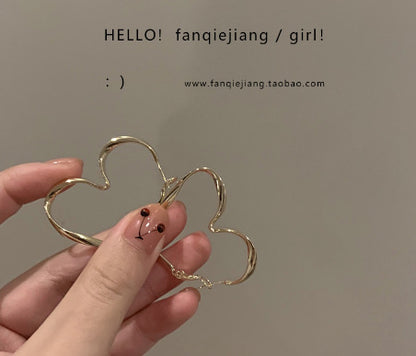 Exaggerated big love earrings