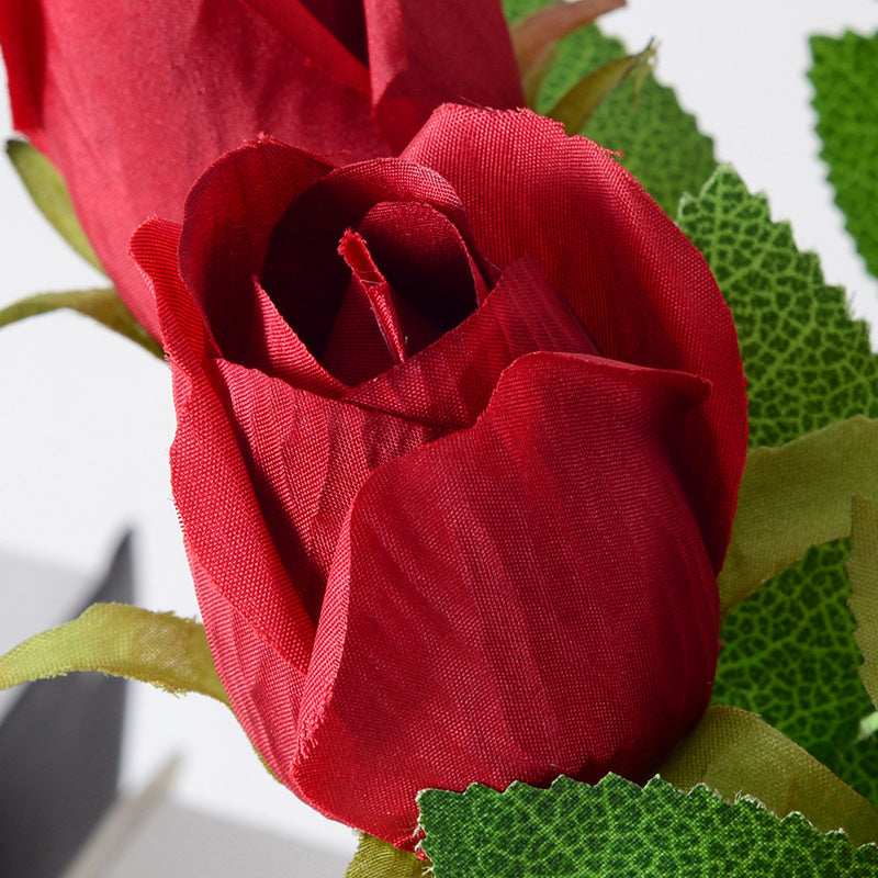 Artificial rose bud silk flower