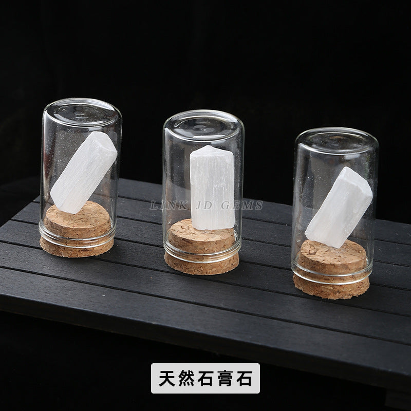 Botella de los deseos con muestra de mineral de roca de cristal 