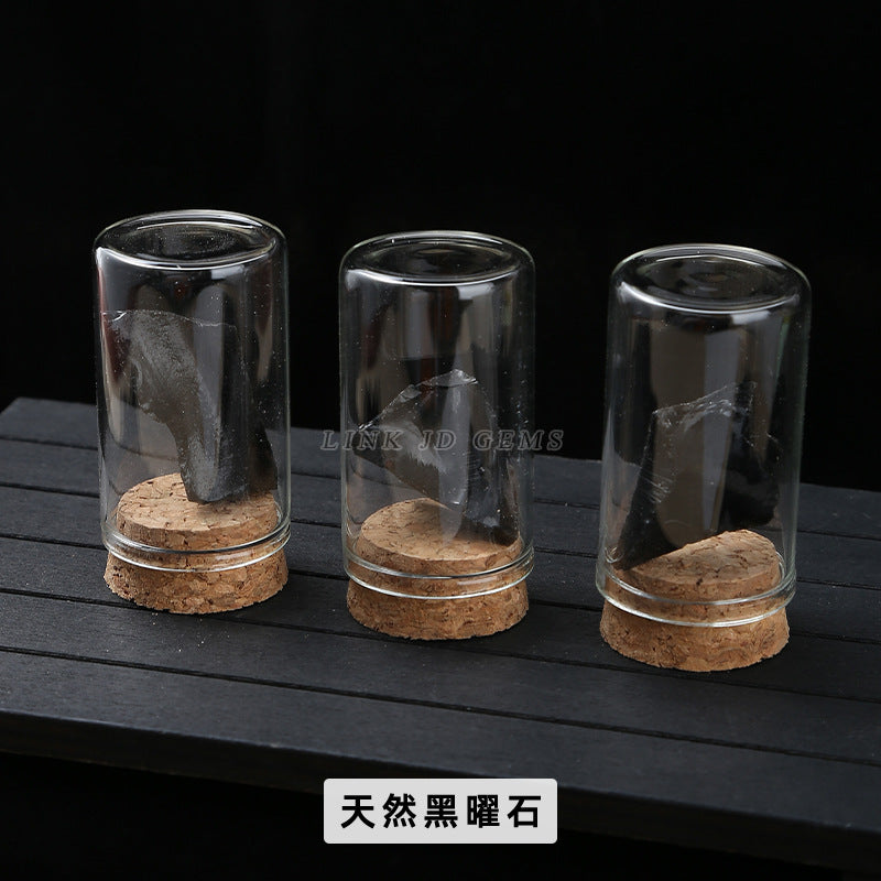 Botella de los deseos con muestra de mineral de roca de cristal 