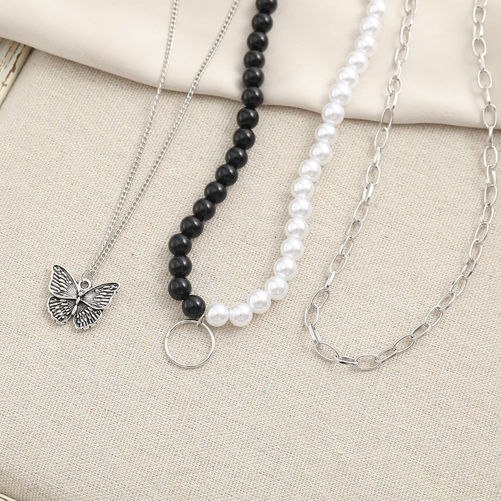Butterfly Pendant Multi-layer Necklace Black and White Beads