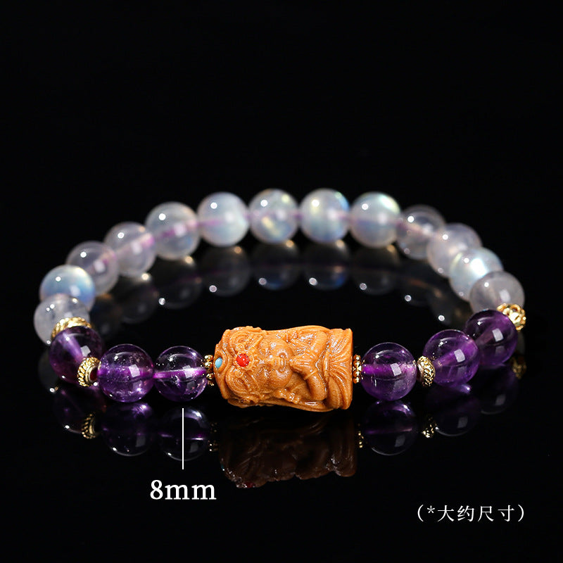 Gray moonstone and amethyst sandalwood Tara bracelet.