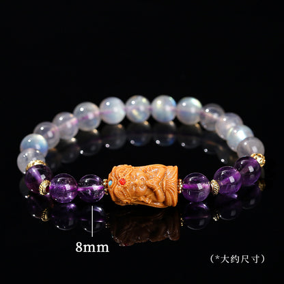 Gray moonstone and amethyst sandalwood Tara bracelet.