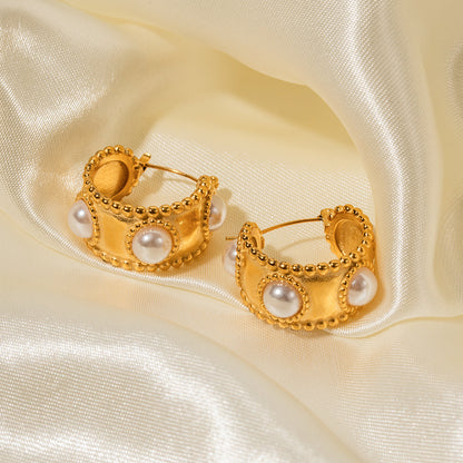 C-shaped pearl earrings