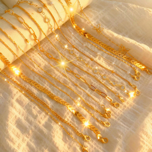 Juego de 14 tobilleras con diamantes y mariposas 