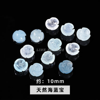 Aquamarine engraved rose inlaid with loose beads