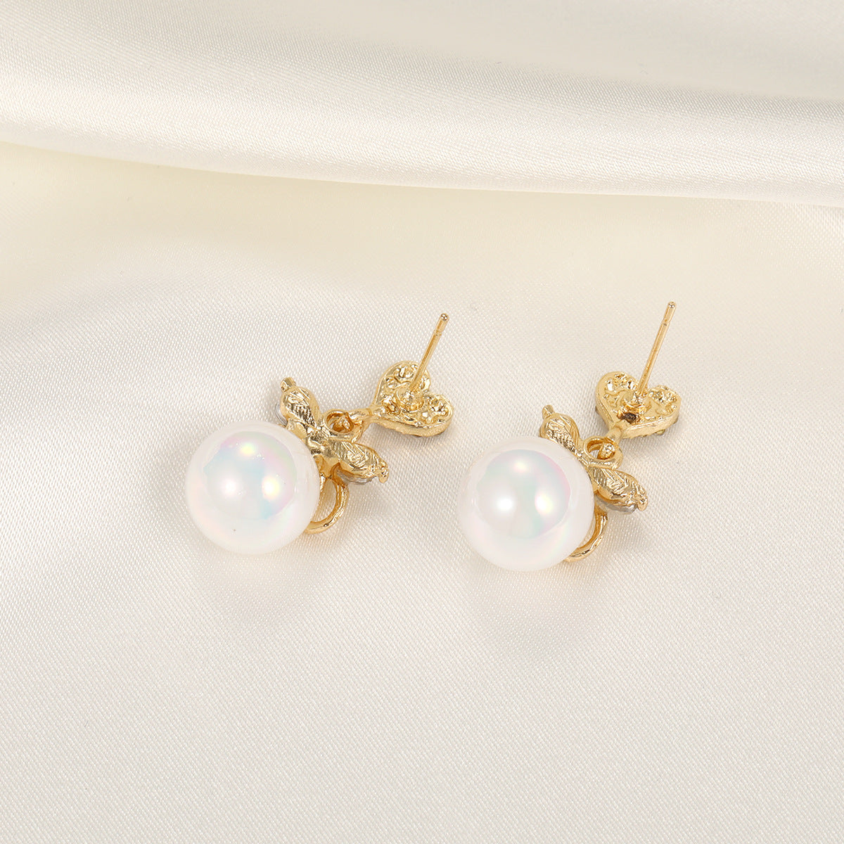 Pearl Bow C-Hoop Earrings